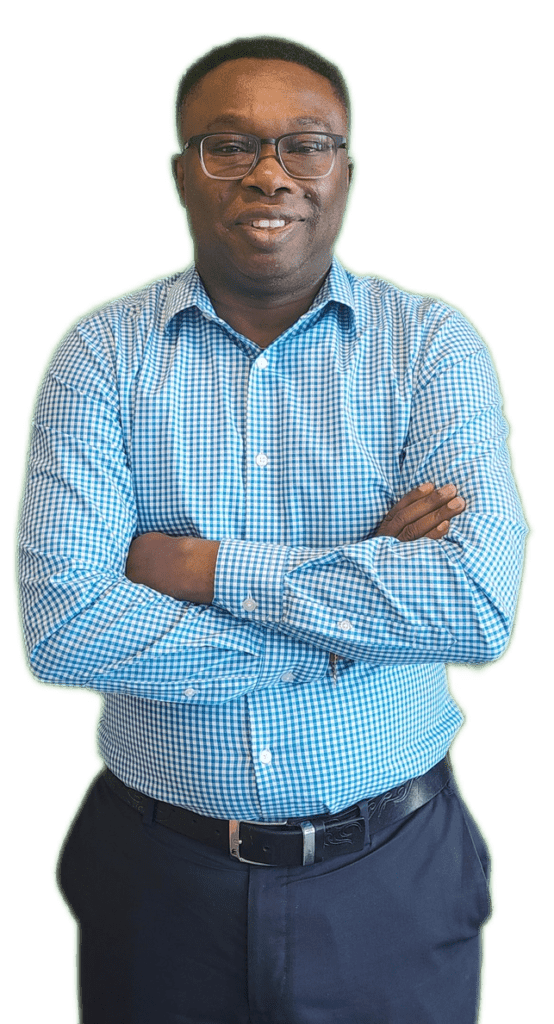 A man with his arms crossed wearing a blue shirt.